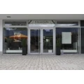 Logo Friseurstudio Kamm und Schere Claudia Merkel