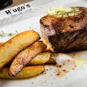 Logo Hugos Restaurant, Bar, Lounge