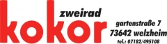 Logo Kokor, Michael