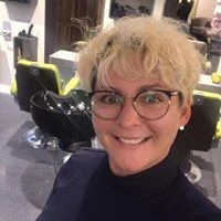 Tina J.